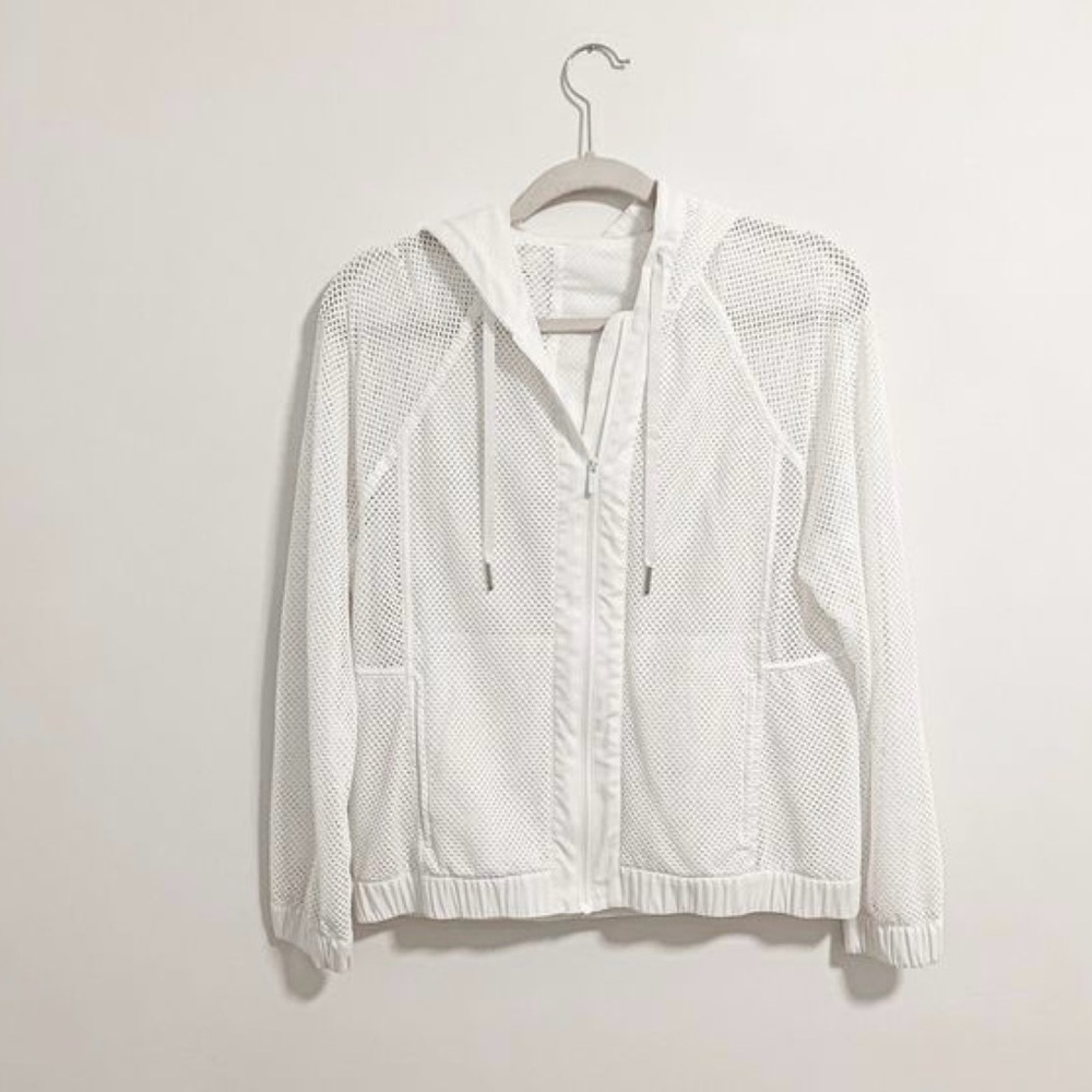 Lululemon perforated white jacket size 6. Unworn !